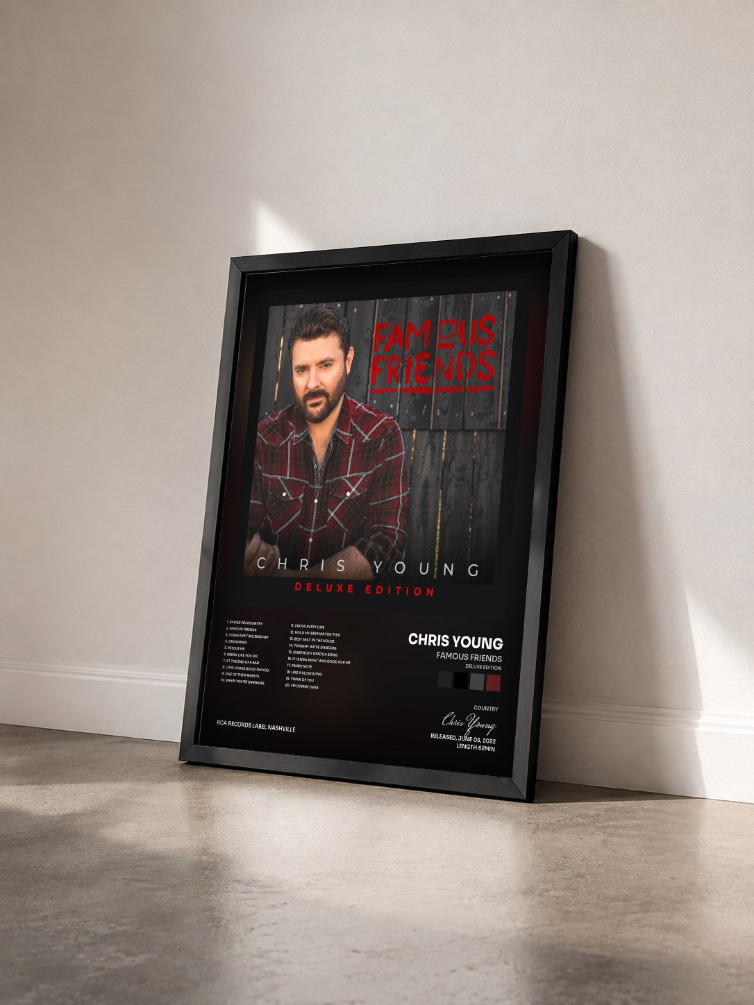 #noir Tableau de l'album Famous Friends (Deluxe Edition) de Chris Young vu de trois quarts, cadre noir