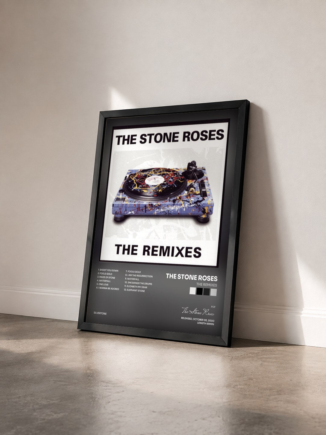 #noir Tableau de l'album The Remixes de The Stone Roses vu de trois quarts, cadre noir