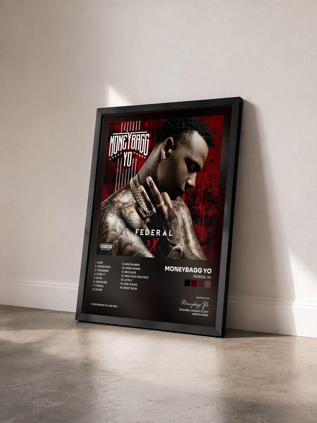 #noir Tableau de l'album Federal 3X de Moneybagg Yo vu de trois quarts, cadre noir
