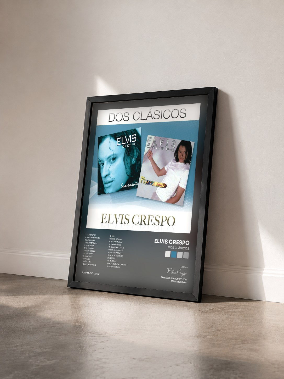 #noir Tableau de l'album Dos Clásicos de Elvis Crespo vu de trois quarts, cadre noir