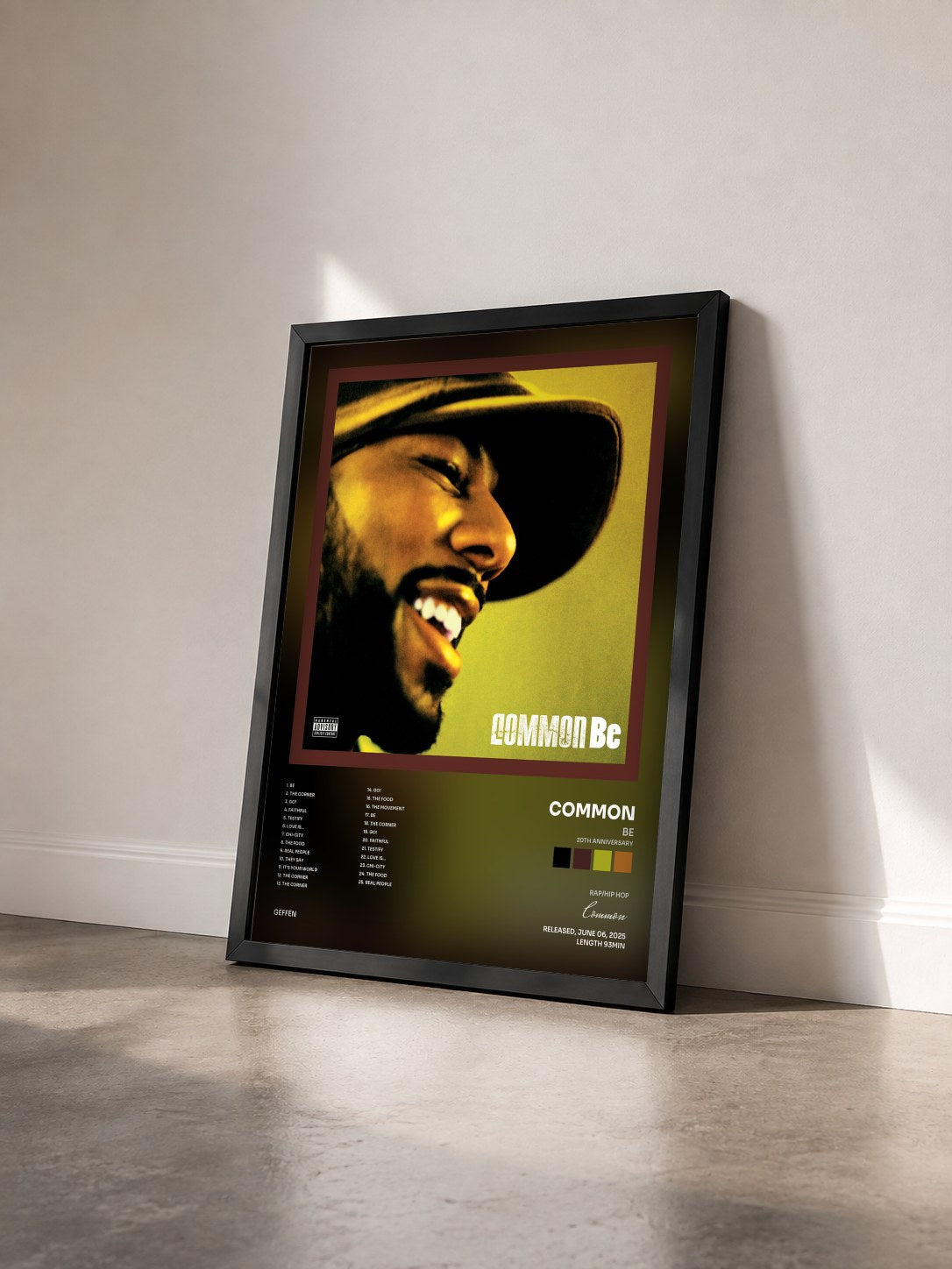 #noir Tableau de l'album Be (20th Anniversary) de Common vu de trois quarts, cadre noir
