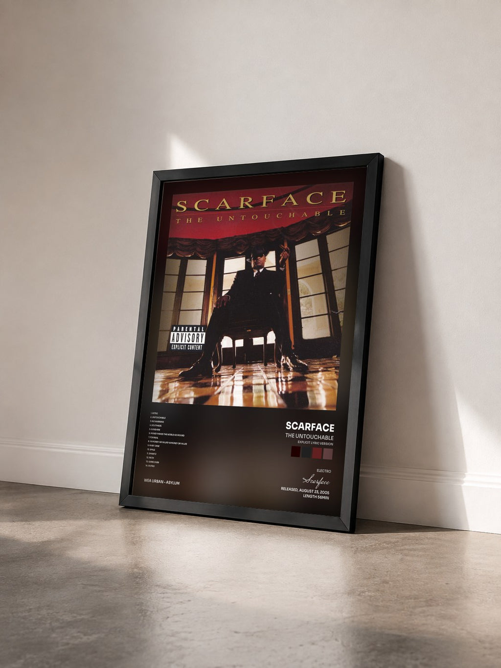 #noir Tableau de l'album The Untouchable (Explicit Lyric Version) de Scarface vu de trois quarts, cadre noir