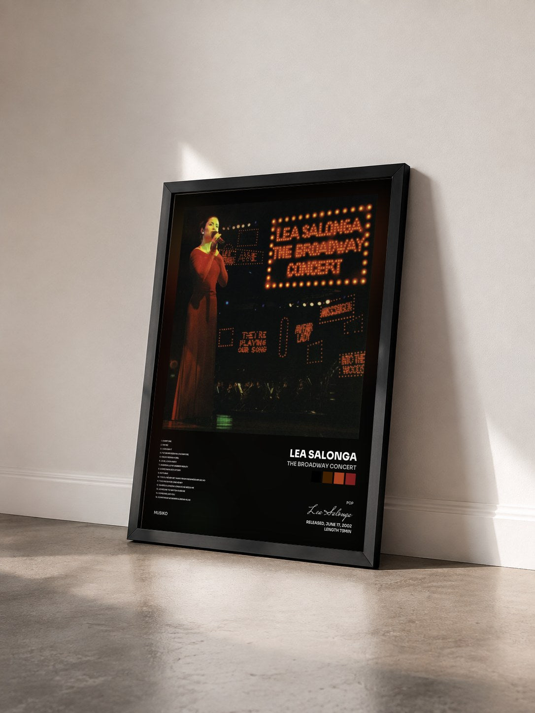 #noir Tableau de l'album The Broadway Concert de Lea Salonga vu de trois quarts, cadre noir