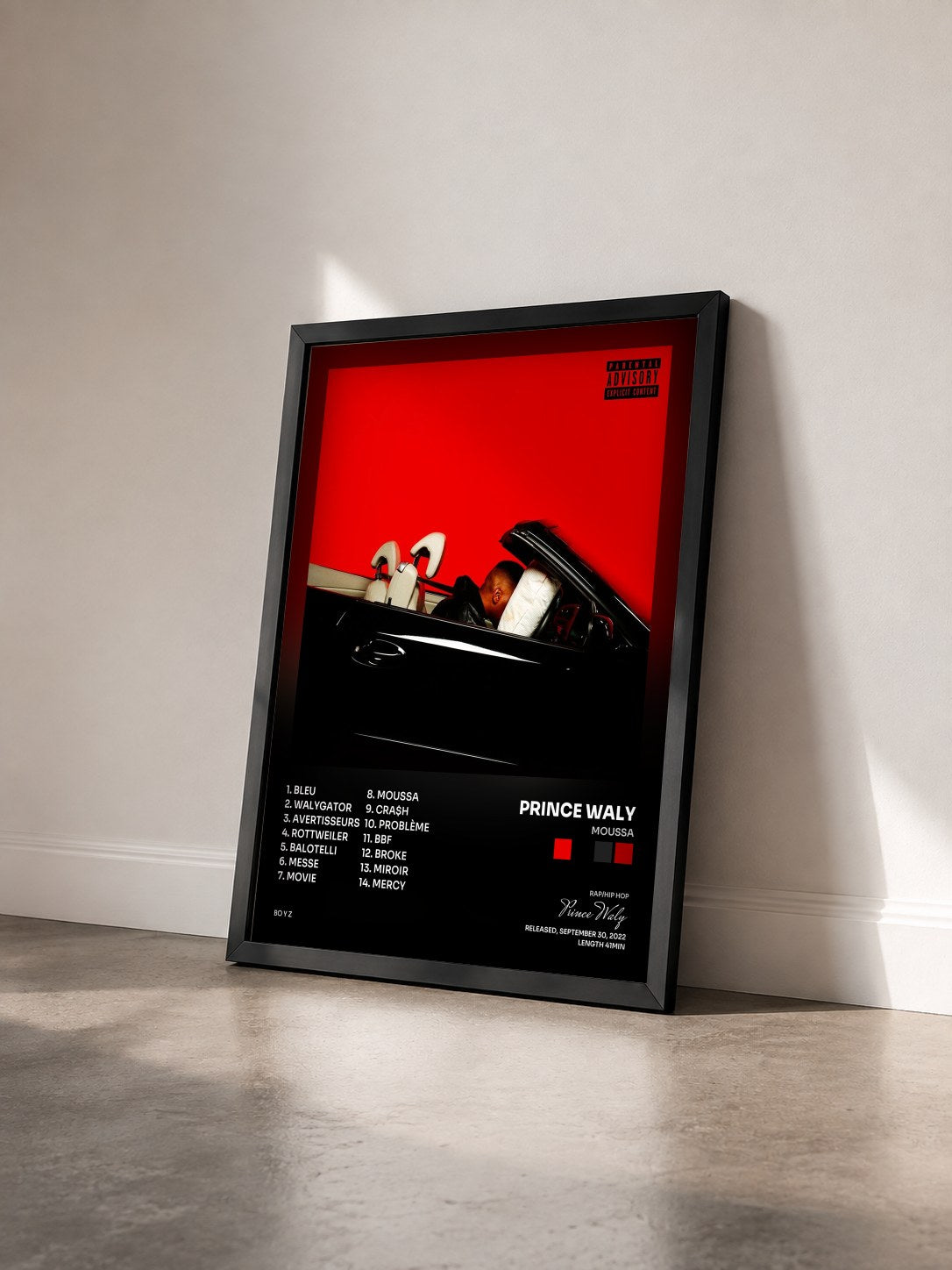 #noir Tableau de l'album Moussa de Prince Waly vu de trois quarts, cadre noir