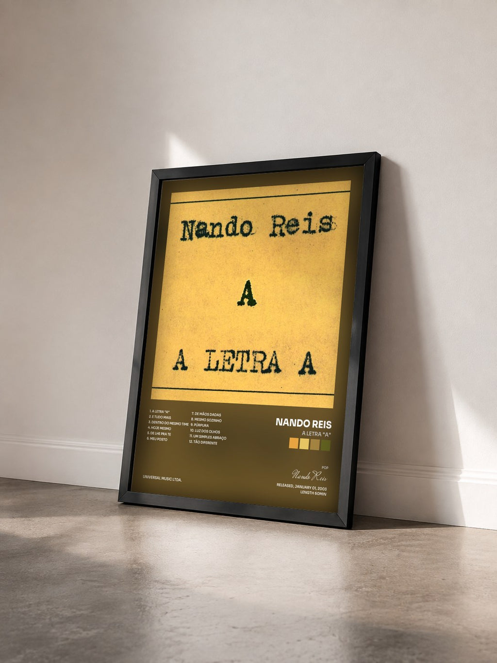 #noir Tableau de l'album A Letra "A" de Nando Reis vu de trois quarts, cadre noir