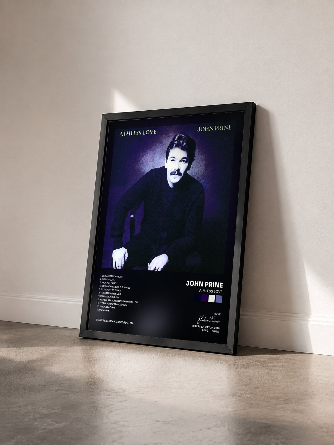 #noir Tableau de l'album Aimless Love de John Prine vu de trois quarts, cadre noir