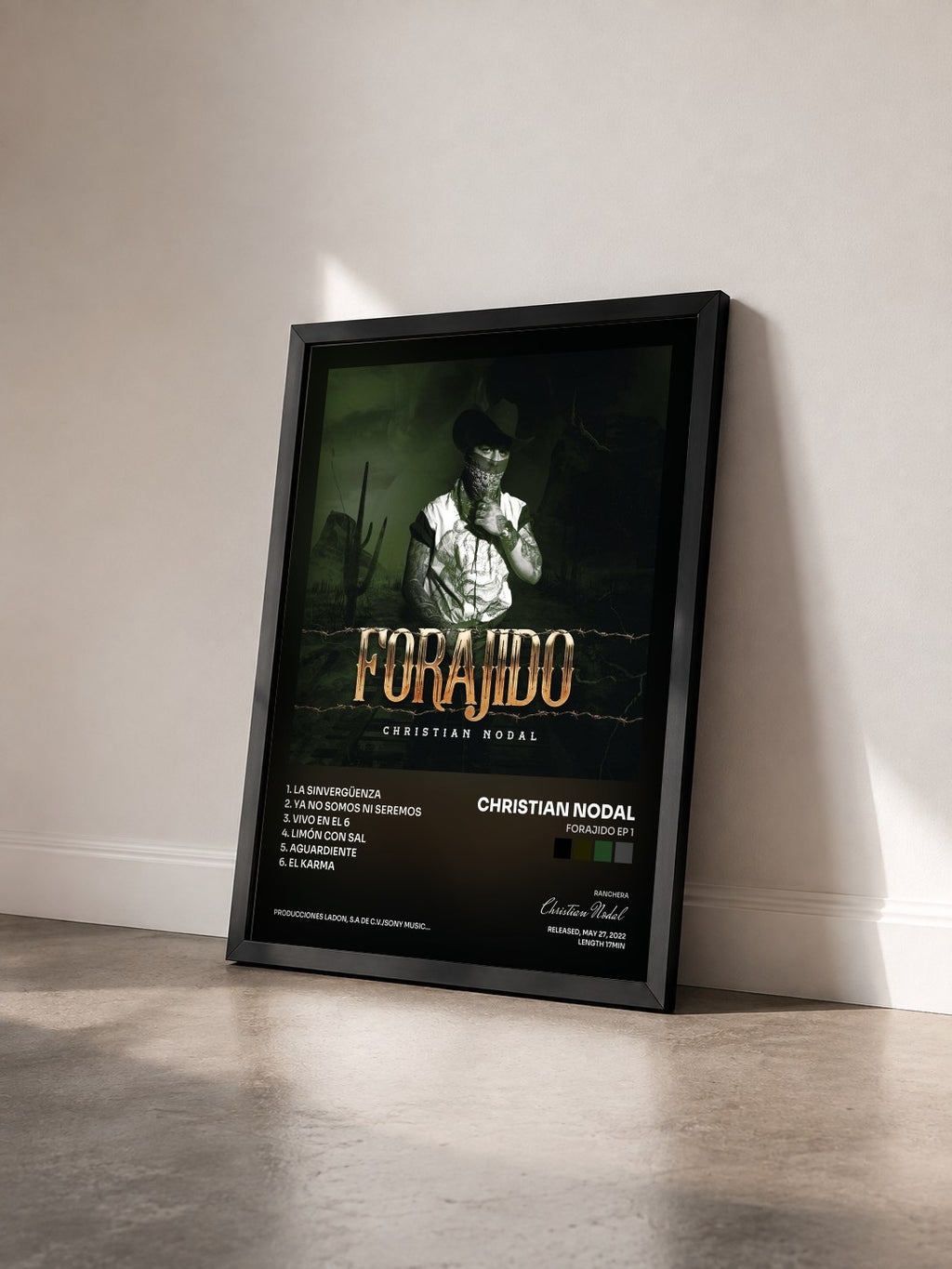 #noir Tableau de l'album Forajido EP 1 de Christian Nodal vu de trois quarts, cadre noir