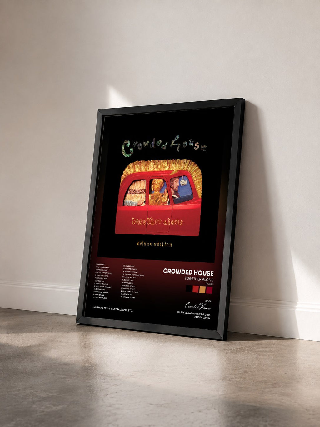 #noir Tableau de l'album Together Alone (Deluxe) de Crowded House vu de trois quarts, cadre noir
