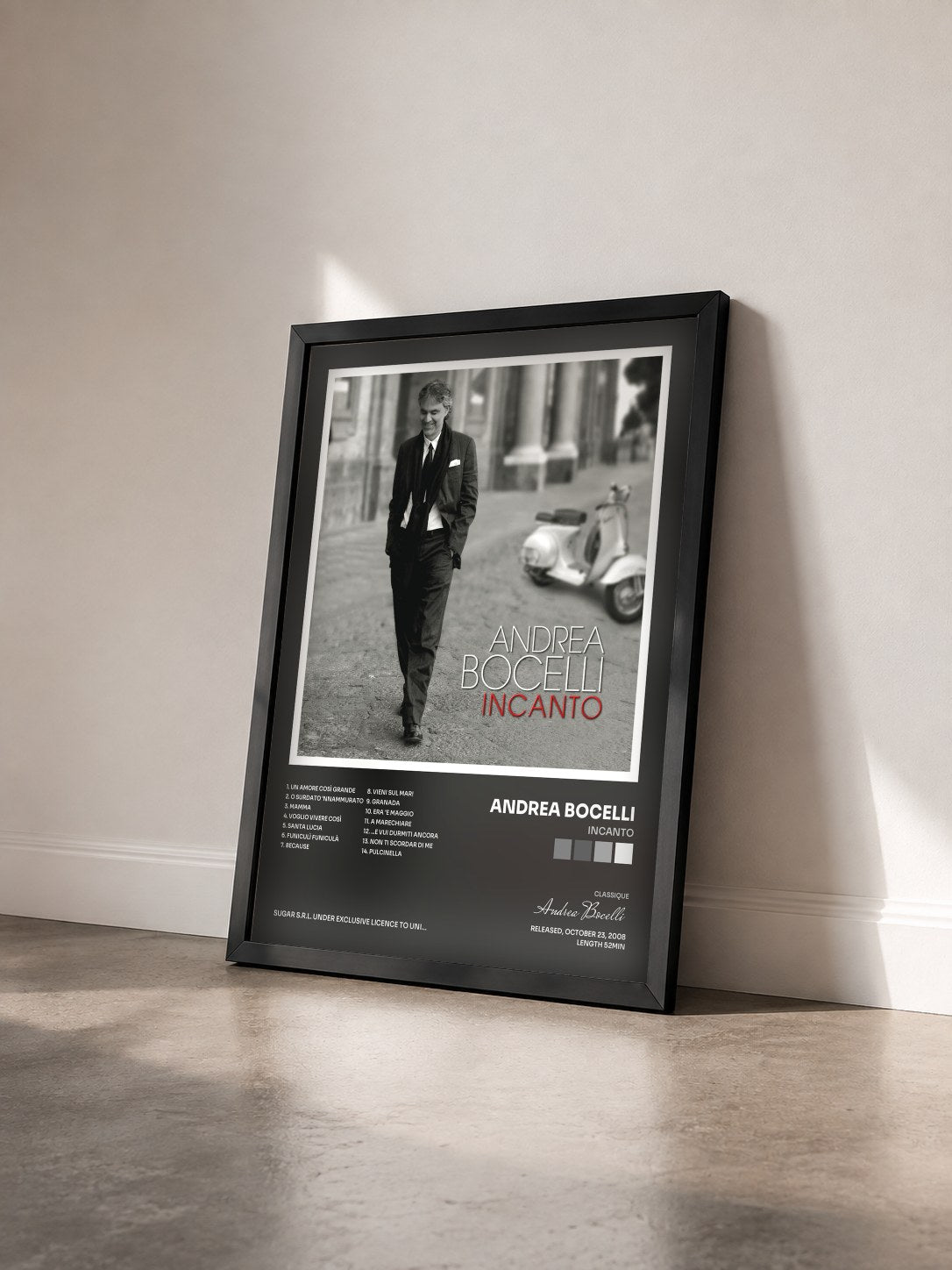 #noir Tableau de l'album Incanto de Andrea Bocelli vu de trois quarts, cadre noir