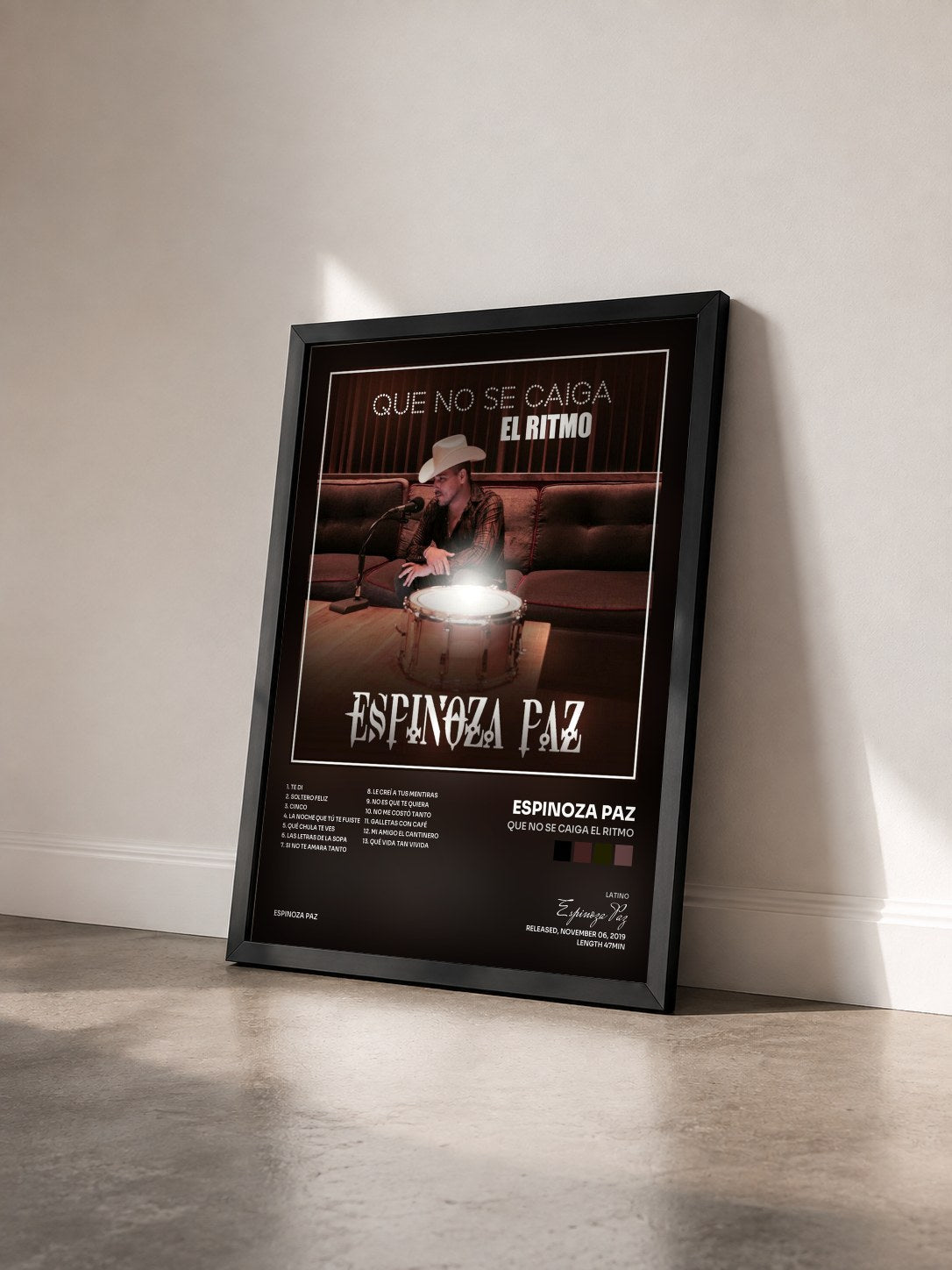 #noir Tableau de l'album Que No Se Caiga el Ritmo de Espinoza Paz vu de trois quarts, cadre noir
