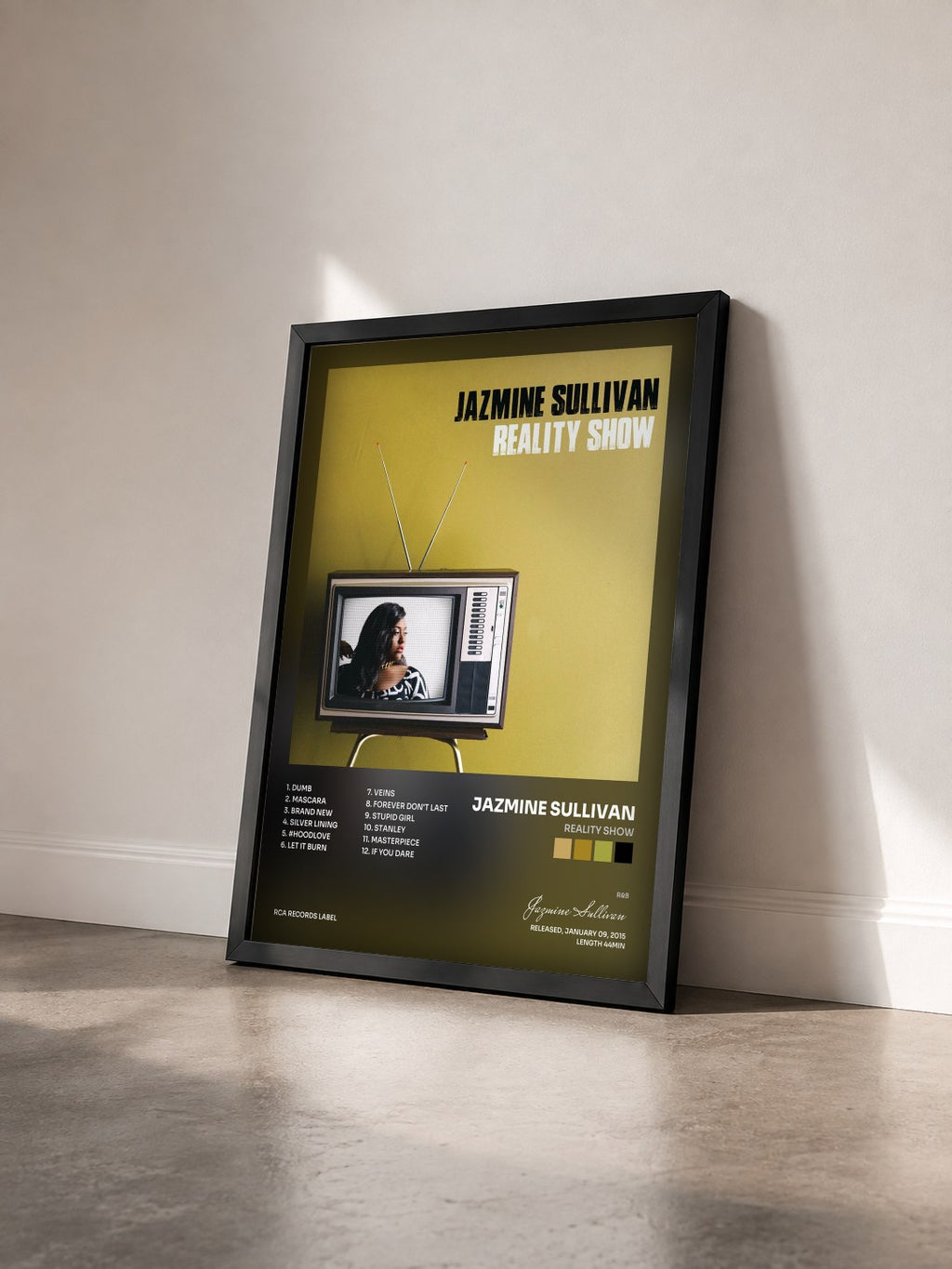 #noir Tableau de l'album Reality Show de Jazmine Sullivan vu de trois quarts, cadre noir