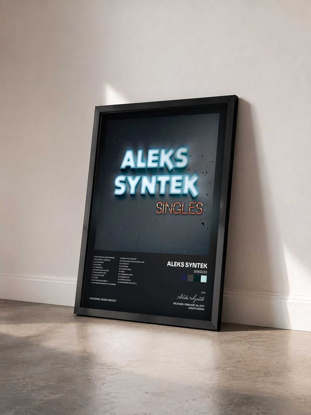 #noir Tableau de l'album Singles de Aleks Syntek vu de trois quarts, cadre noir