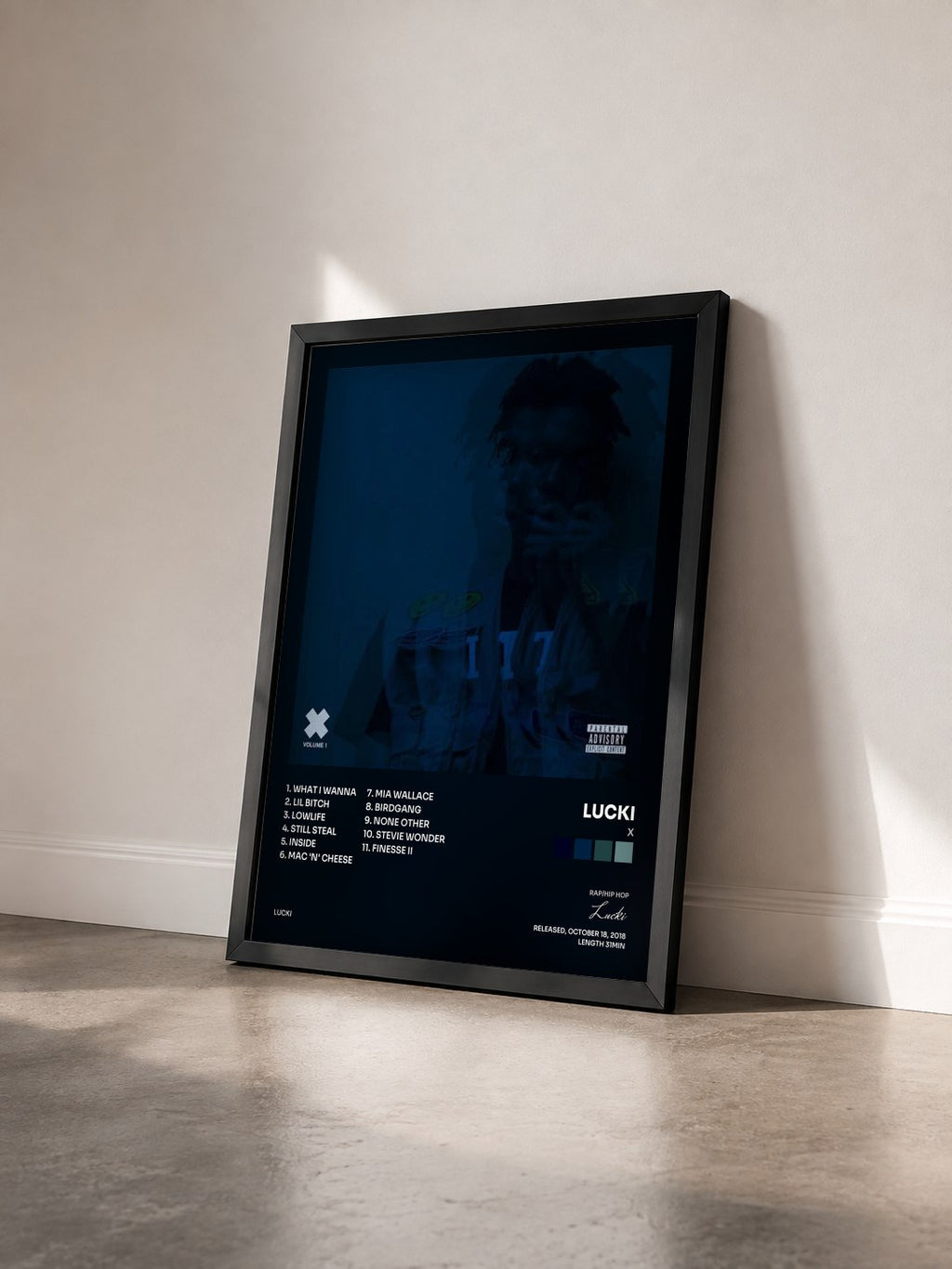 #noir Tableau de l'album X de Lucki vu de trois quarts, cadre noir