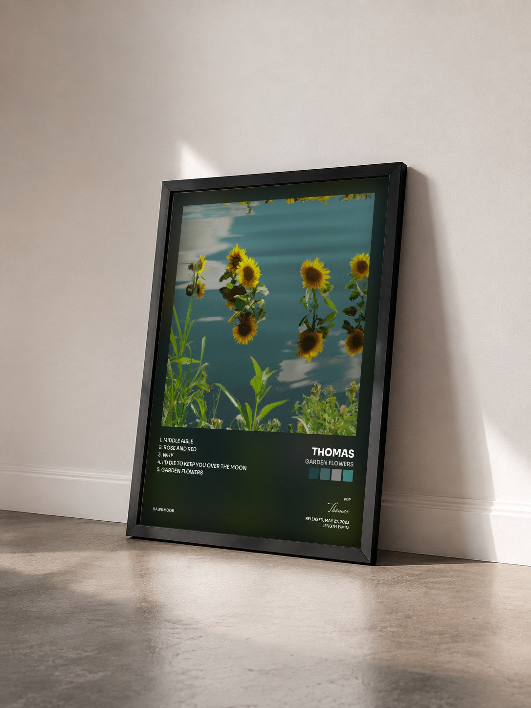 #noir Tableau de l'album Garden Flowers de Thomas vu de trois quarts, cadre noir