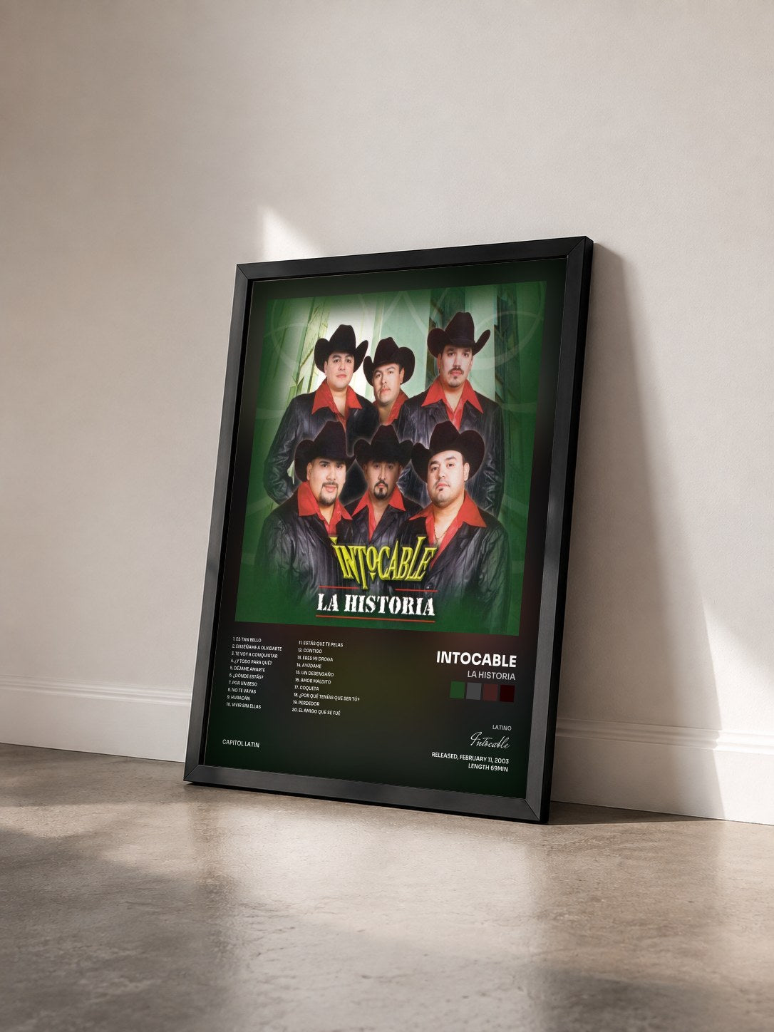 #noir Tableau de l'album La Historia de Intocable vu de trois quarts, cadre noir