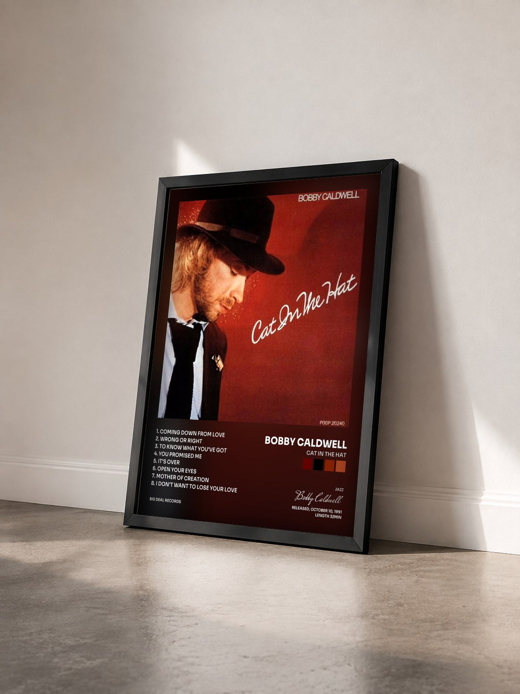 #noir Tableau de l'album Cat in the Hat de Bobby Caldwell vu de trois quarts, cadre noir