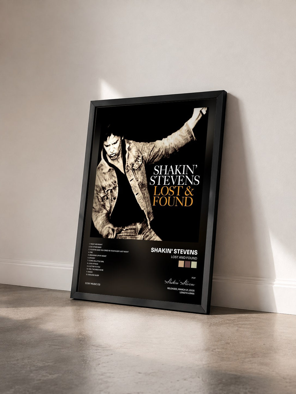 #noir Tableau de l'album Lost And Found de Shakin' Stevens vu de trois quarts, cadre noir