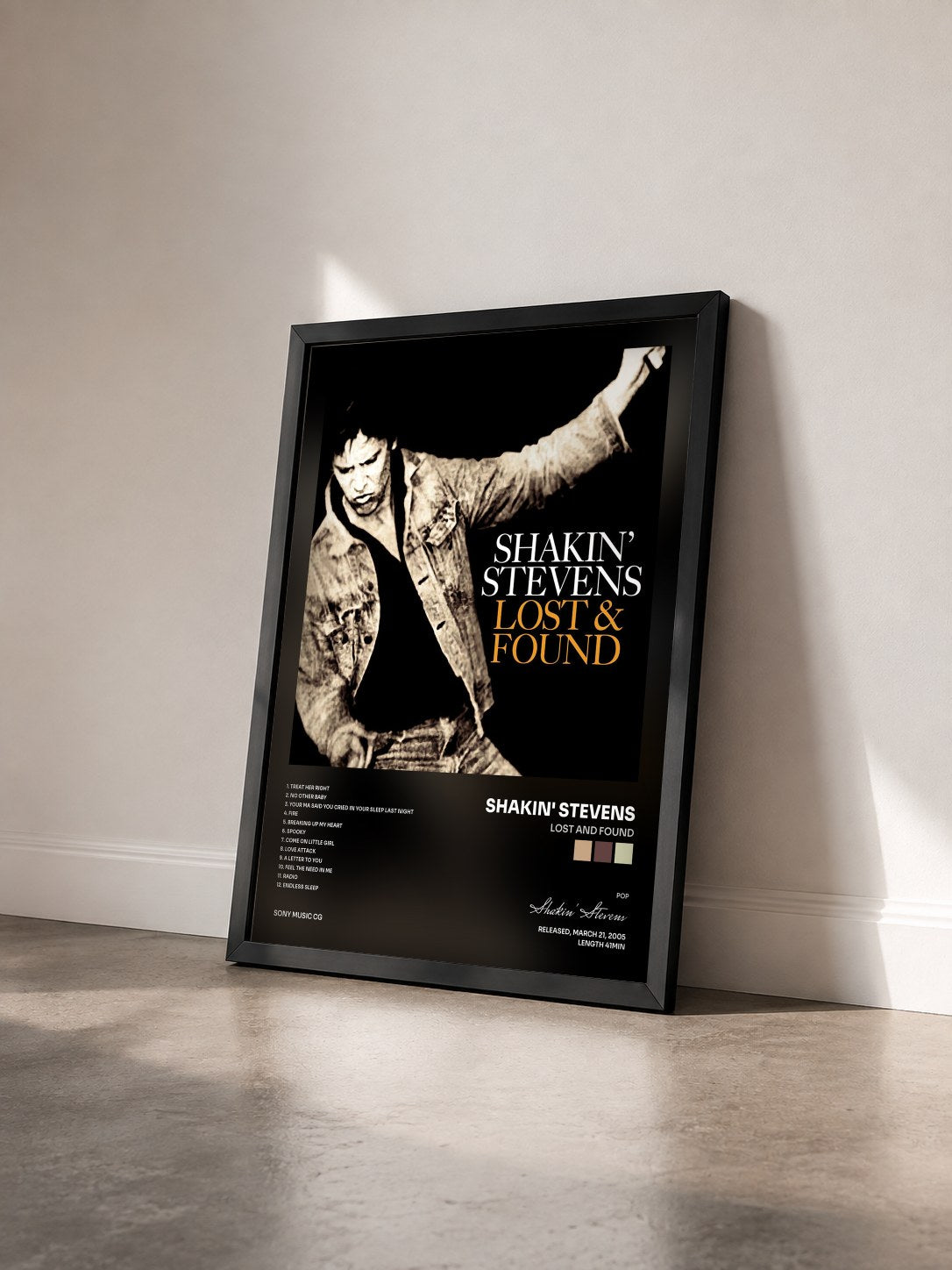 #noir Tableau de l'album Lost And Found de Shakin' Stevens vu de trois quarts, cadre noir