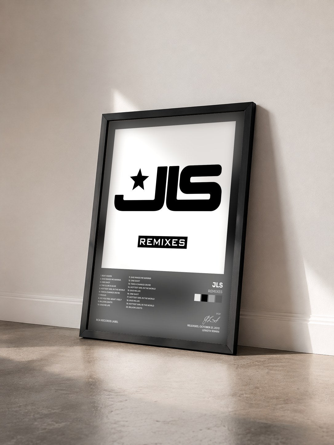 #noir Tableau de l'album Remixes de JLS vu de trois quarts, cadre noir