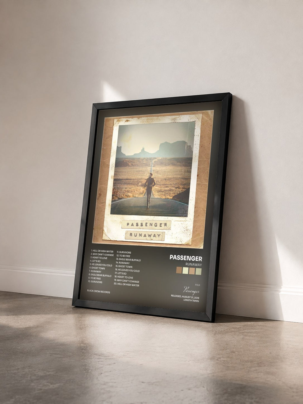 #noir Tableau de l'album Runaway de Passenger vu de trois quarts, cadre noir
