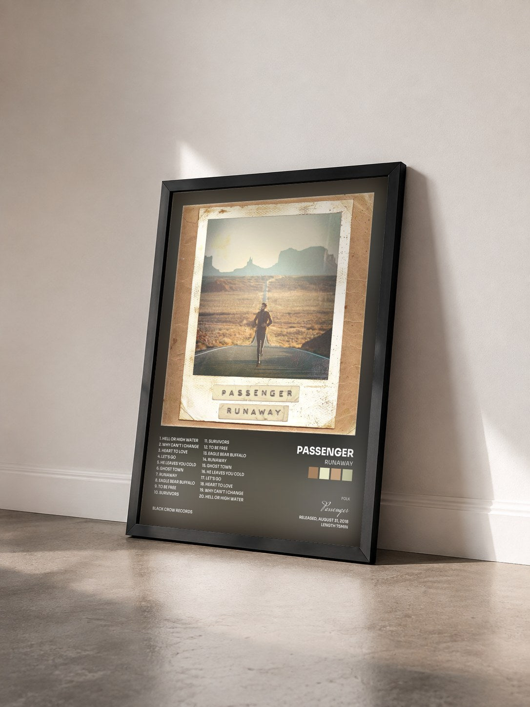 #noir Tableau de l'album Runaway de Passenger vu de trois quarts, cadre noir