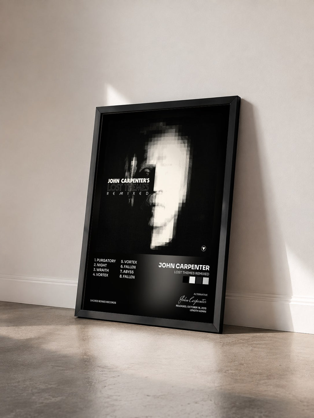 #noir Tableau de l'album Lost Themes Remixed de John Carpenter vu de trois quarts, cadre noir