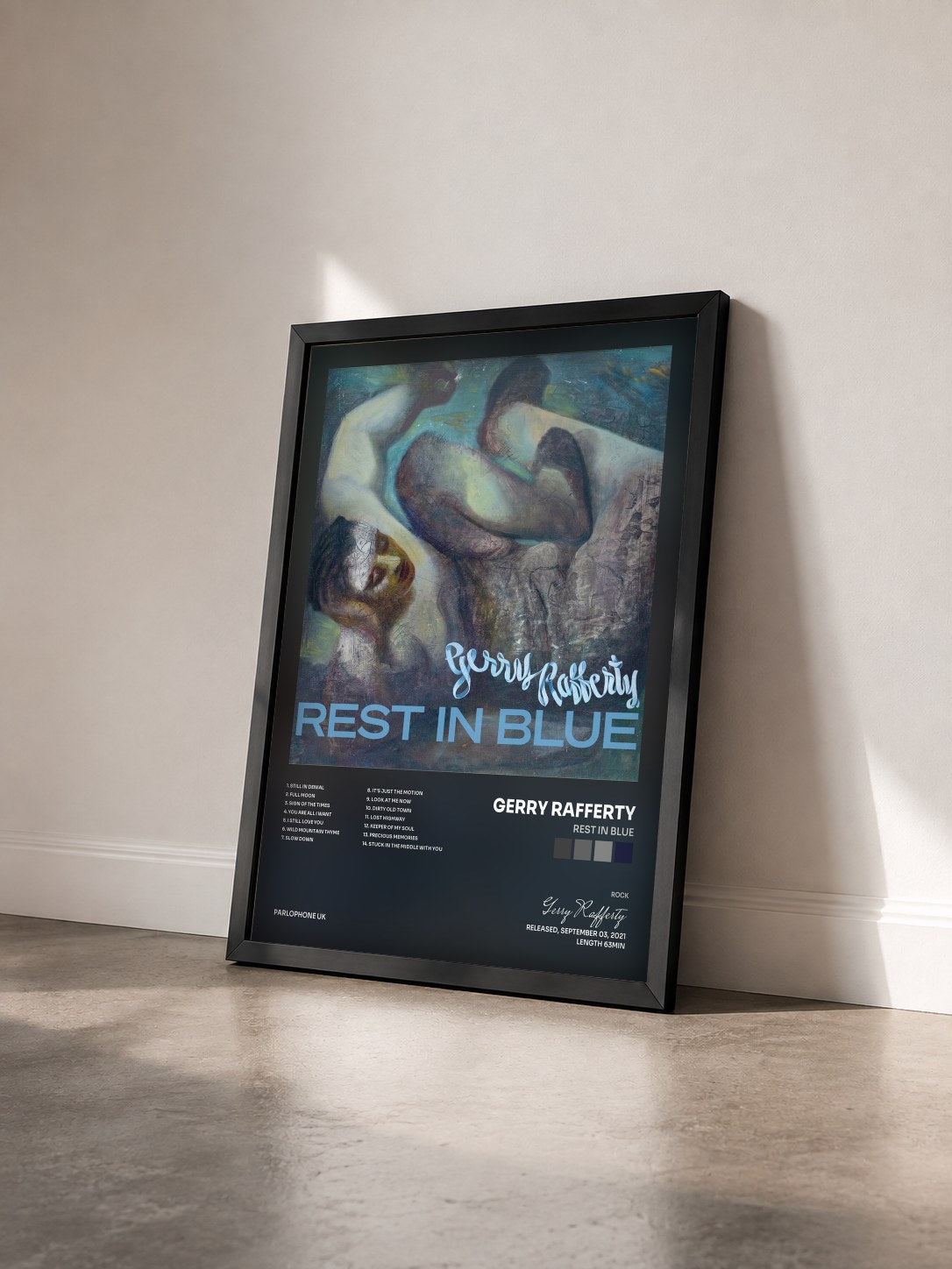 #noir Tableau de l'album Rest In Blue de Gerry Rafferty vu de trois quarts, cadre noir