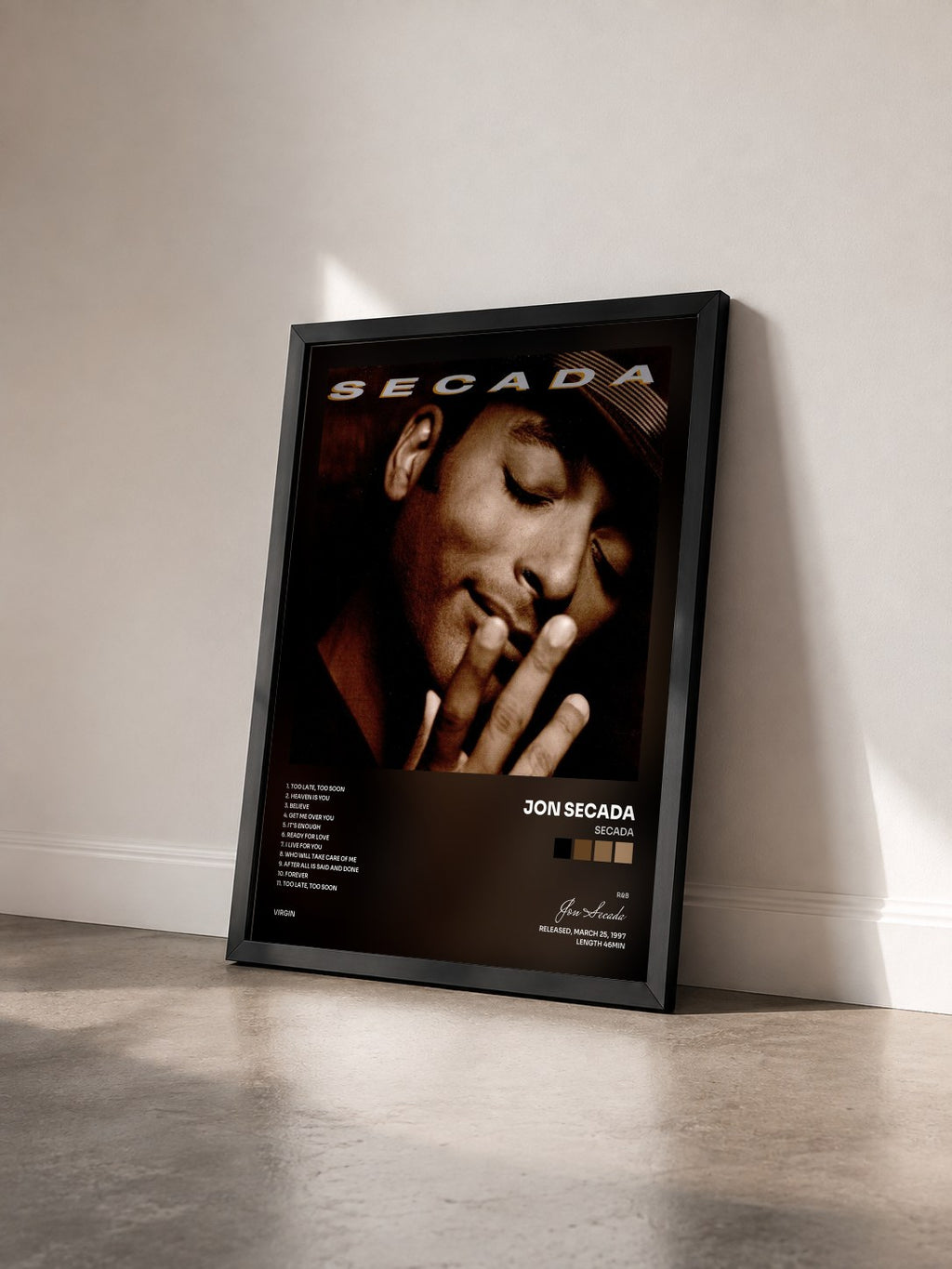 #noir Tableau de l'album Secada de Jon Secada vu de trois quarts, cadre noir