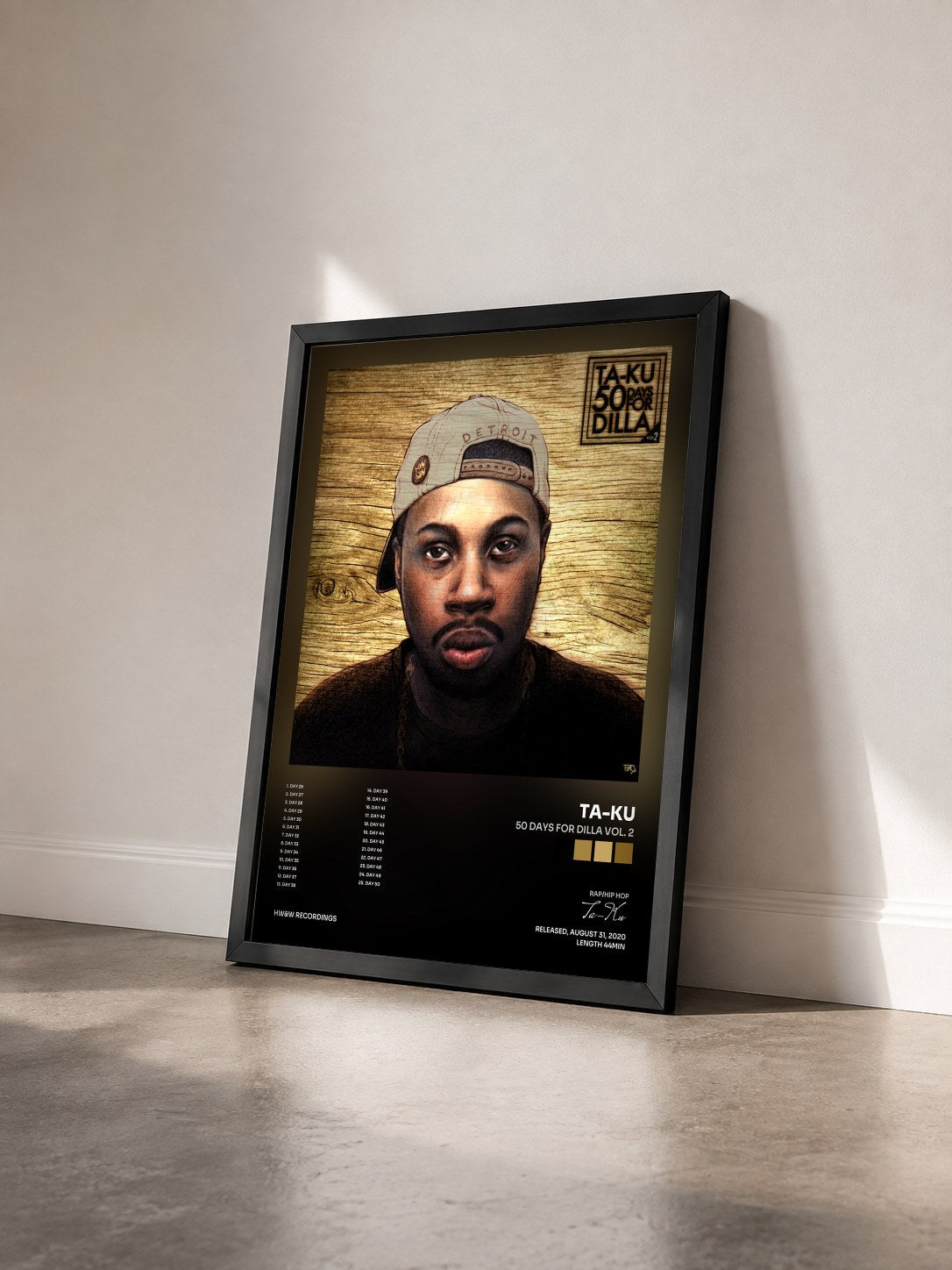 #noir Tableau de l'album 50 Days For Dilla Vol. 2 de Ta-Ku vu de trois quarts, cadre noir