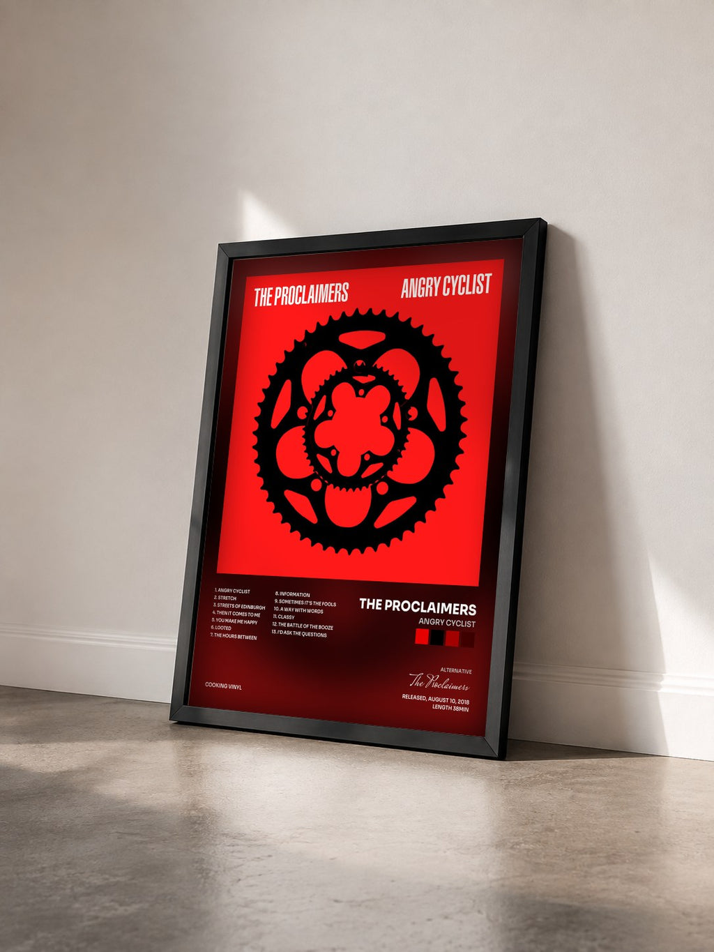 #noir Tableau de l'album Angry Cyclist de The Proclaimers vu de trois quarts, cadre noir