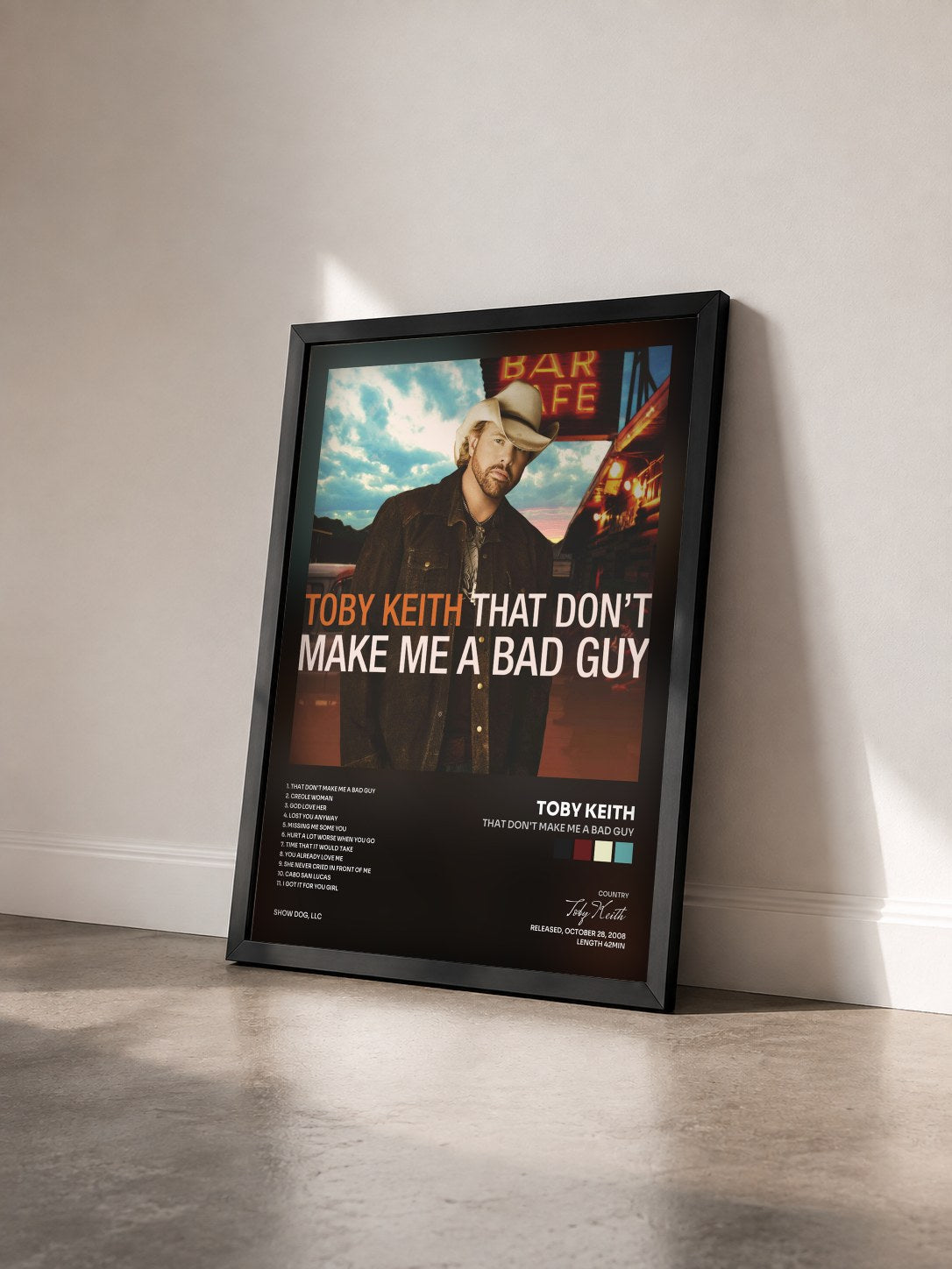 #noir Tableau de l'album That Don't Make Me a Bad Guy de Toby Keith vu de trois quarts, cadre noir