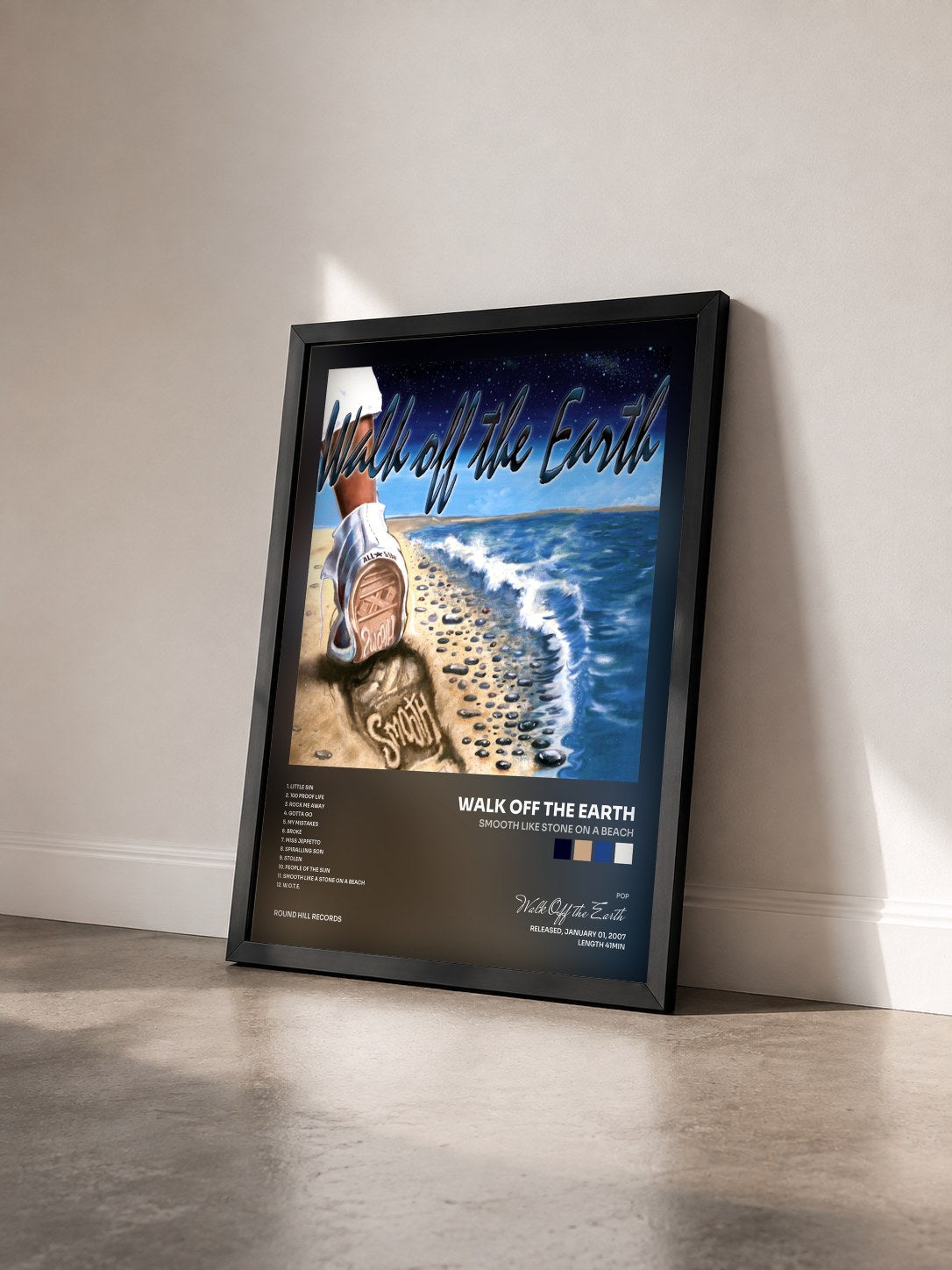 #noir Tableau de l'album Smooth Like Stone On A Beach de Walk Off the Earth vu de trois quarts, cadre noir