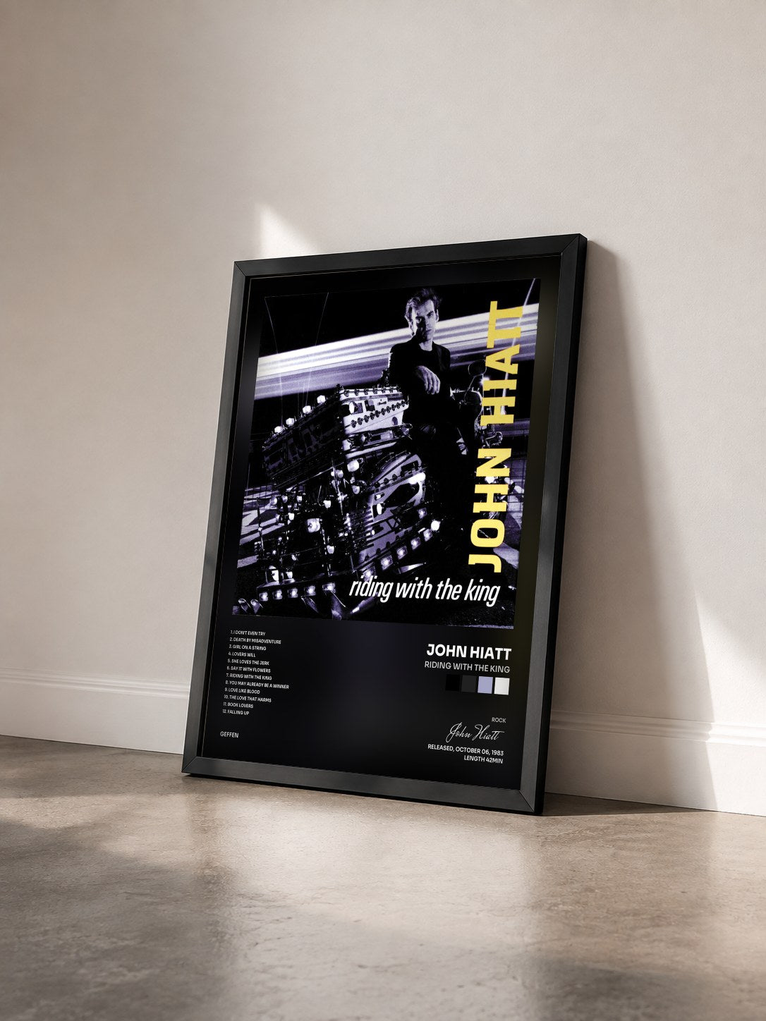 #noir Tableau de l'album Riding With The King de John Hiatt vu de trois quarts, cadre noir