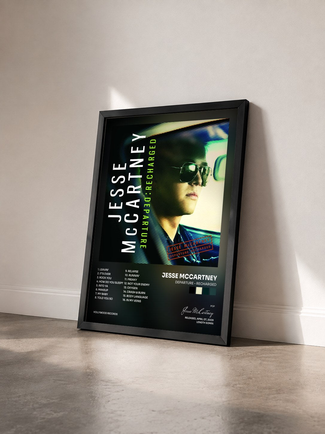#noir Tableau de l'album Departure - Recharged de Jesse McCartney vu de trois quarts, cadre noir