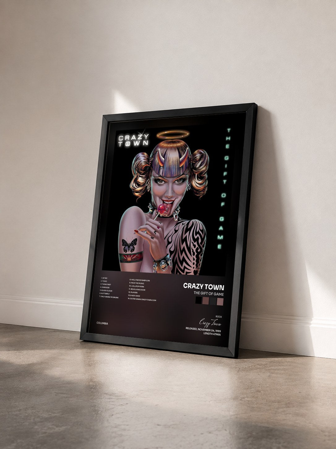 #noir Tableau de l'album The Gift Of Game de Crazy Town vu de trois quarts, cadre noir