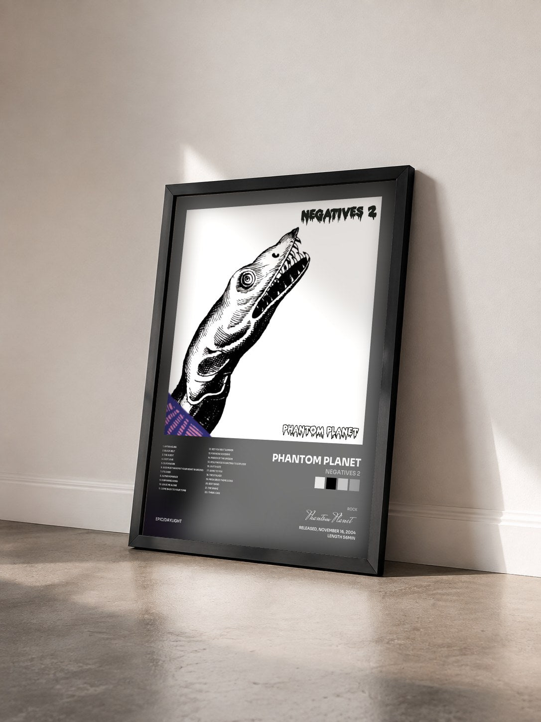 #noir Tableau de l'album Negatives 2 de Phantom Planet vu de trois quarts, cadre noir