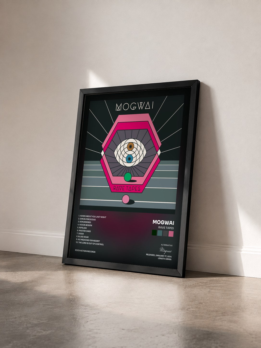 #noir Tableau de l'album Rave Tapes de Mogwai vu de trois quarts, cadre noir