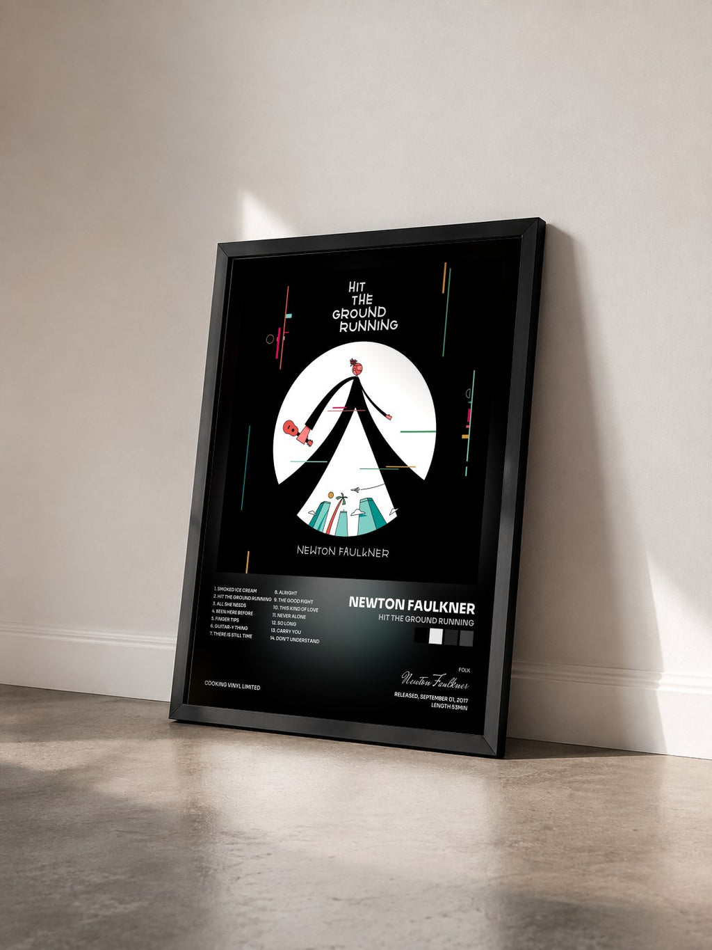 #noir Tableau de l'album Hit the Ground Running de Newton Faulkner vu de trois quarts, cadre noir