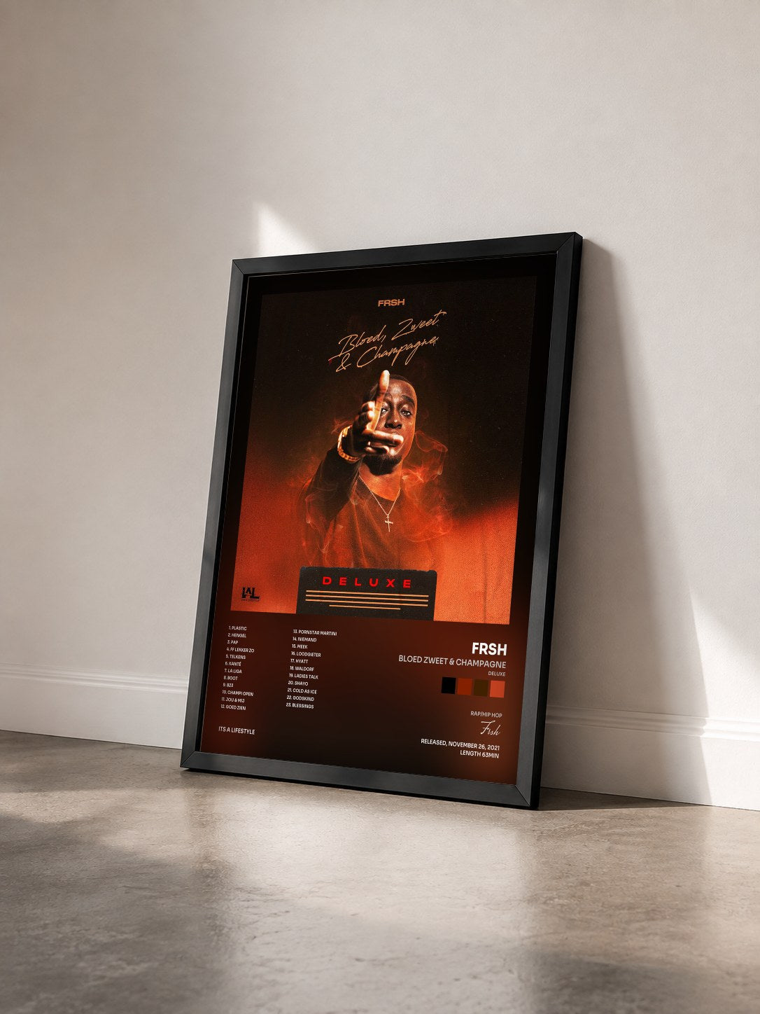 #noir Tableau de l'album Bloed Zweet & Champagne (Deluxe) de Frsh vu de trois quarts, cadre noir