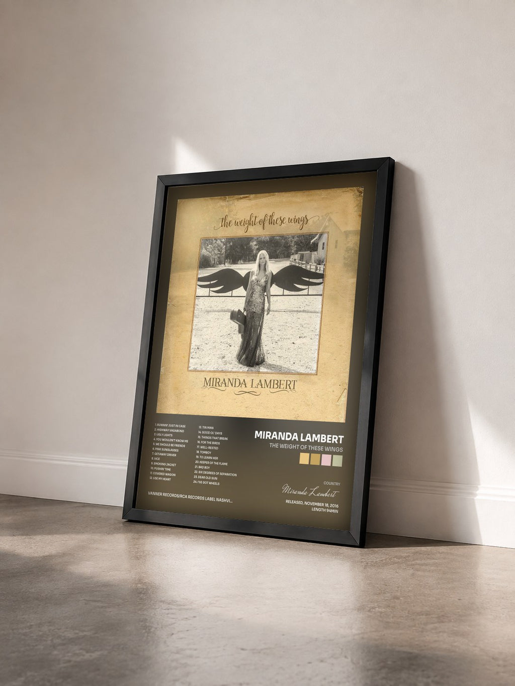 #noir Tableau de l'album The Weight of These Wings de Miranda Lambert vu de trois quarts, cadre noir