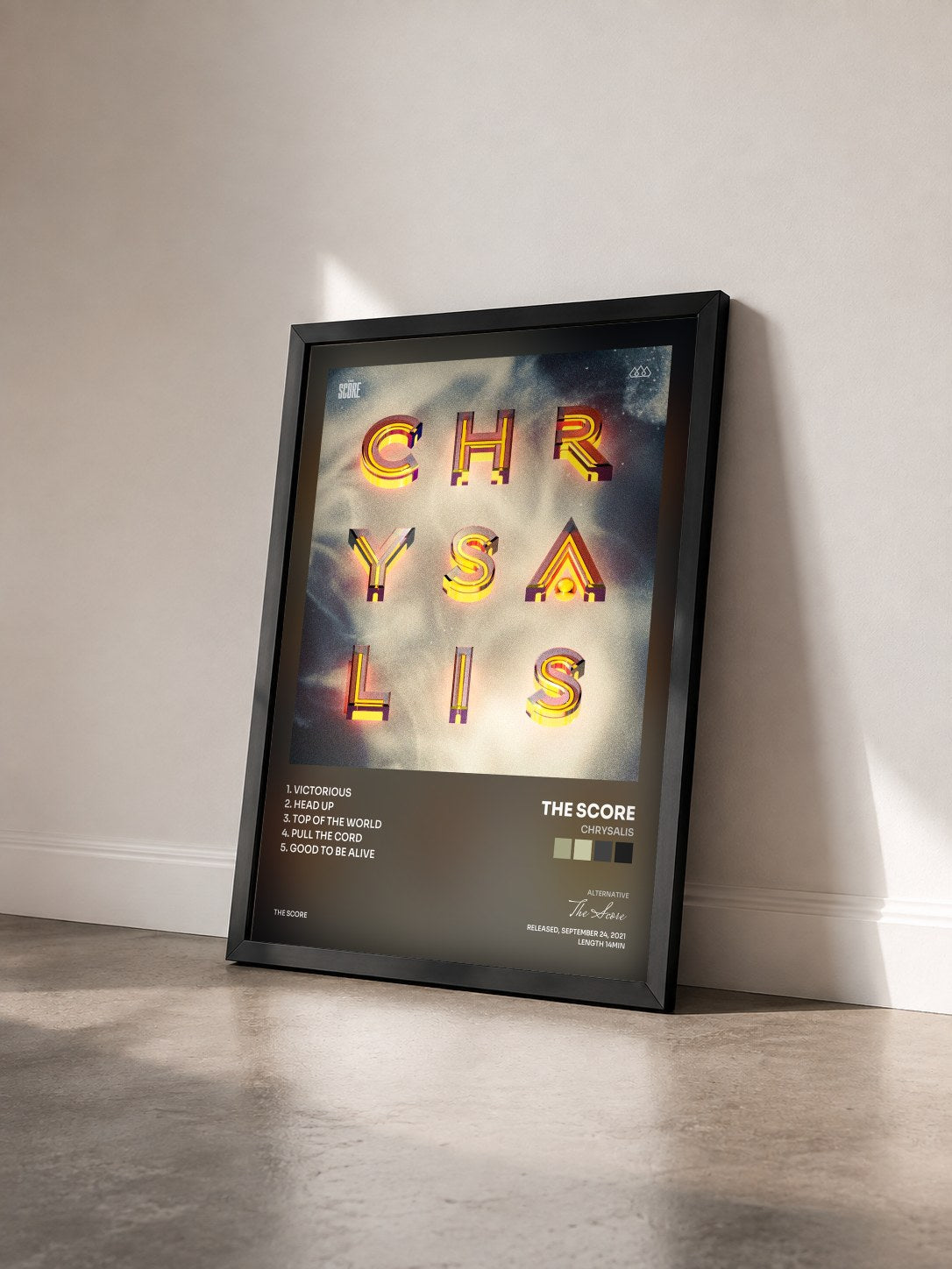 #noir Tableau de l'album Chrysalis de The Score vu de trois quarts, cadre noir