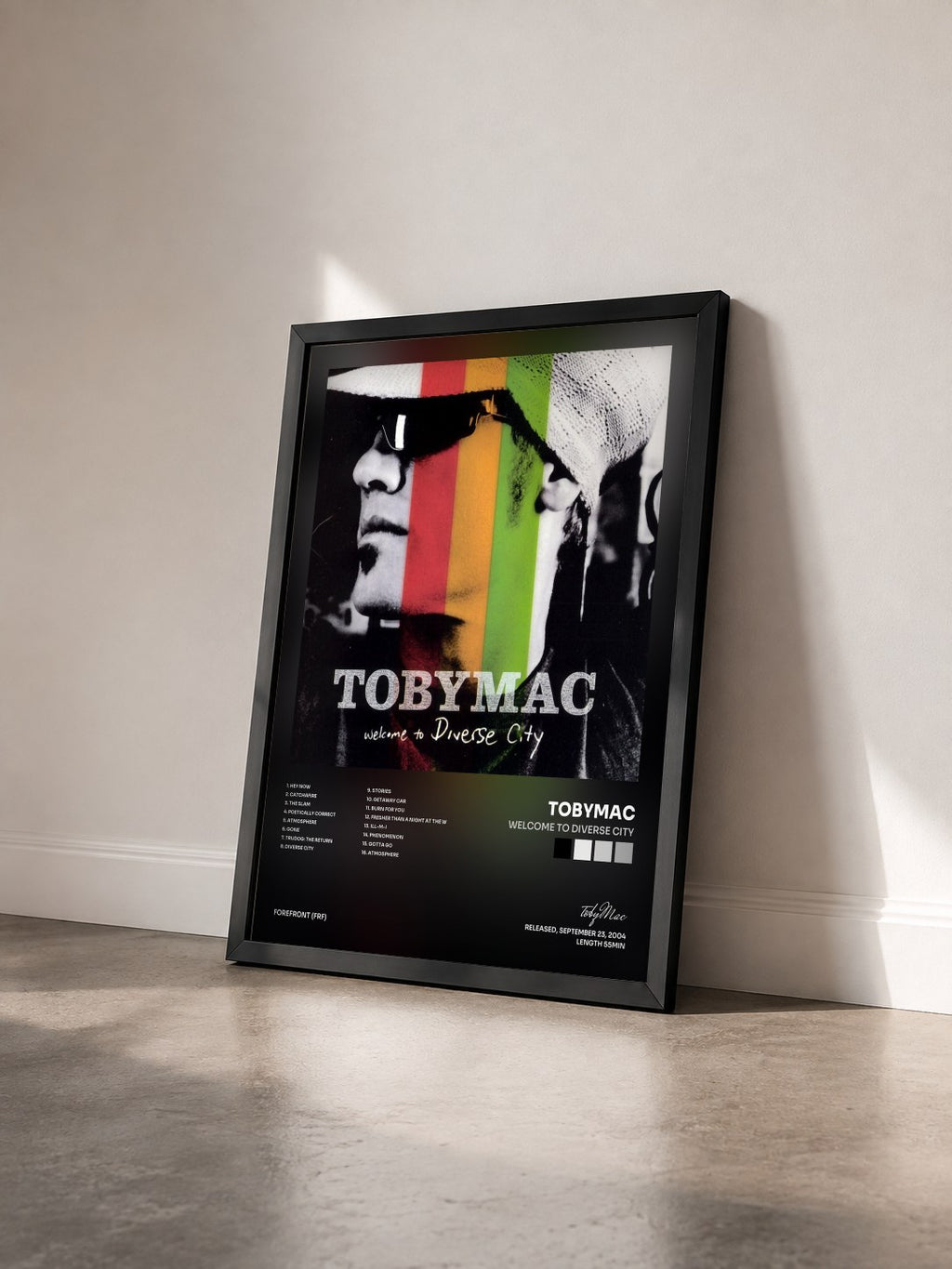 #noir Tableau de l'album Welcome To Diverse City de tobyMac vu de trois quarts, cadre noir