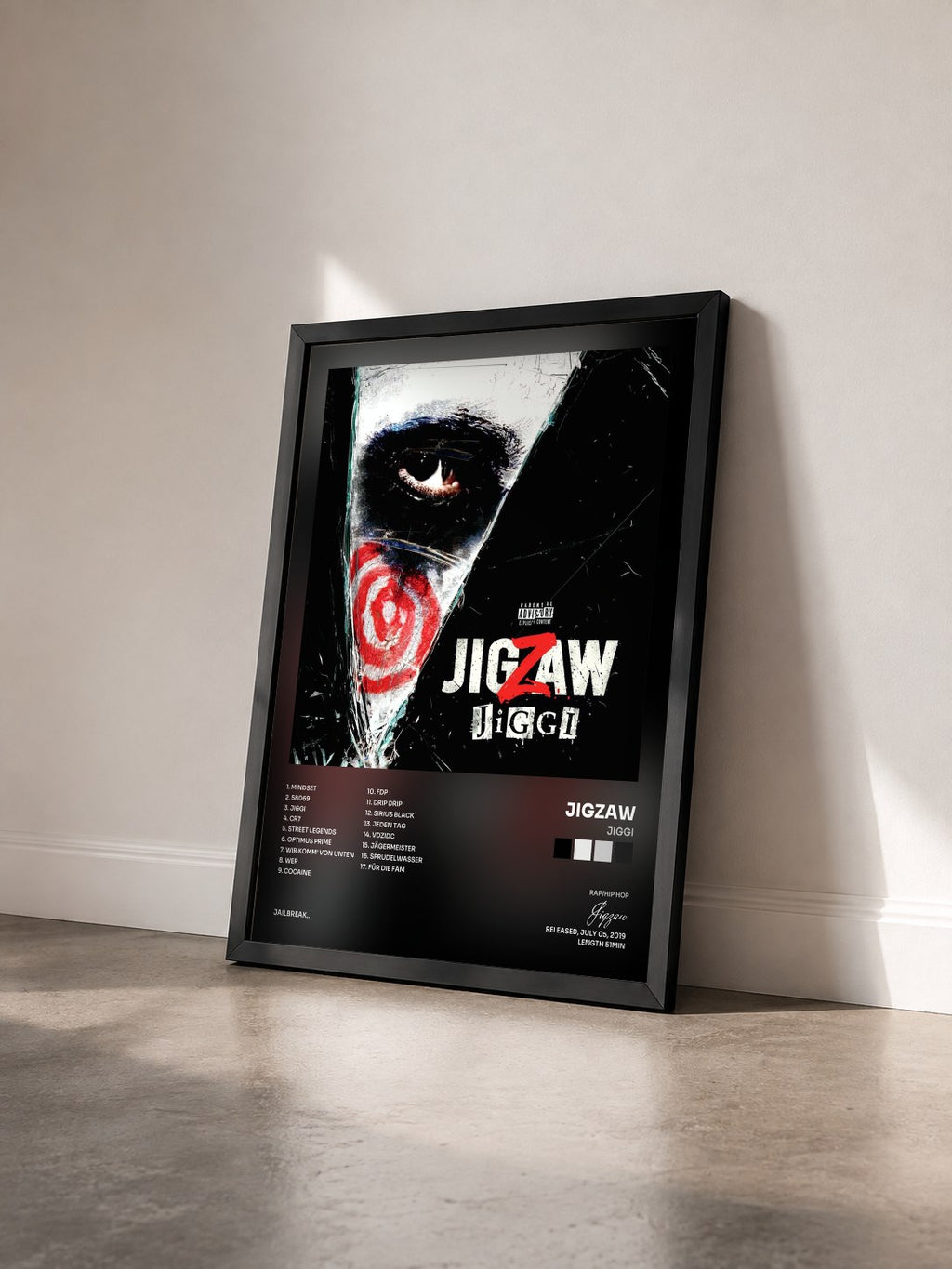 #noir Tableau de l'album Jiggi de Jigzaw vu de trois quarts, cadre noir