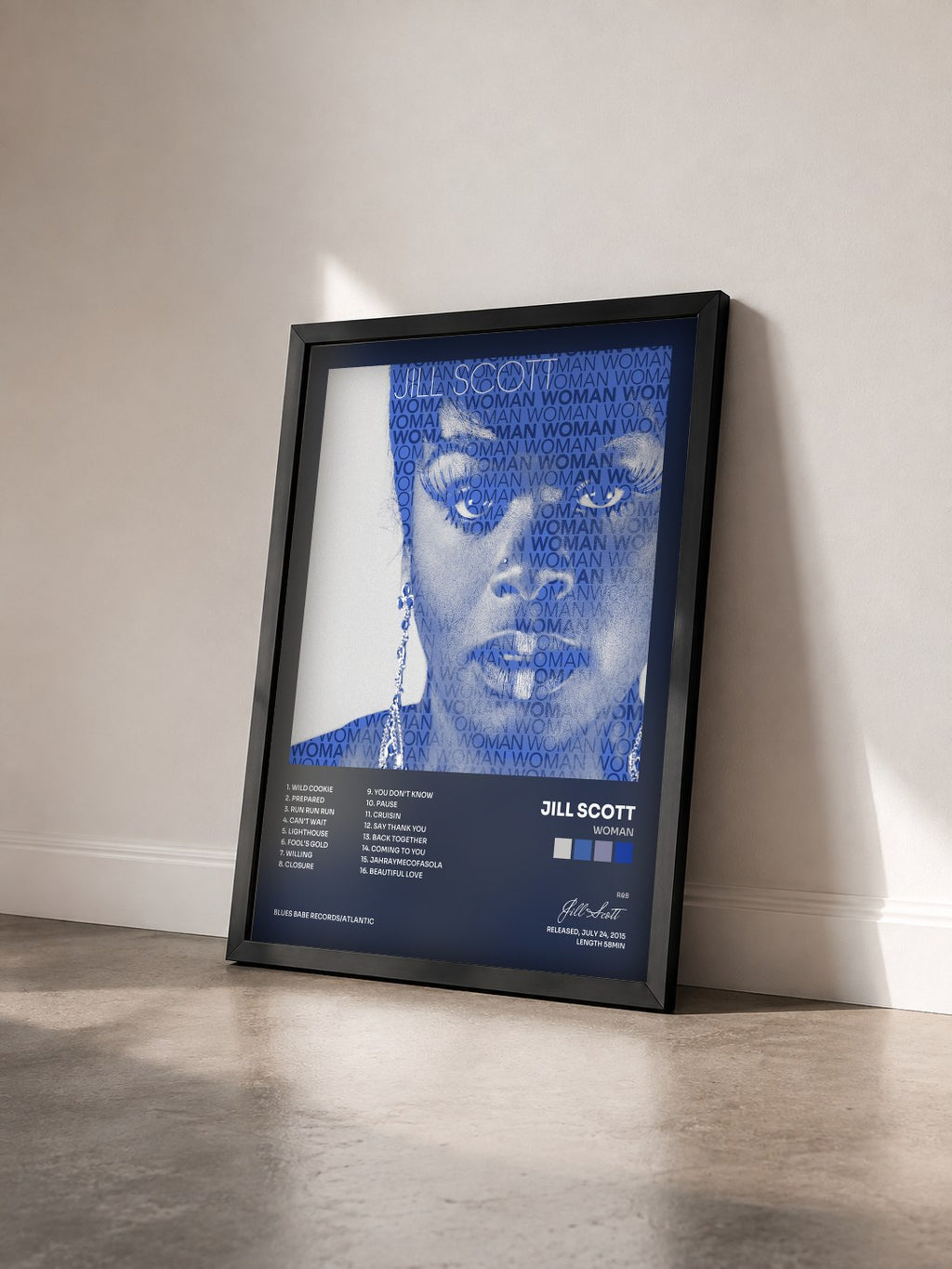 #noir Tableau de l'album Woman de Jill Scott vu de trois quarts, cadre noir