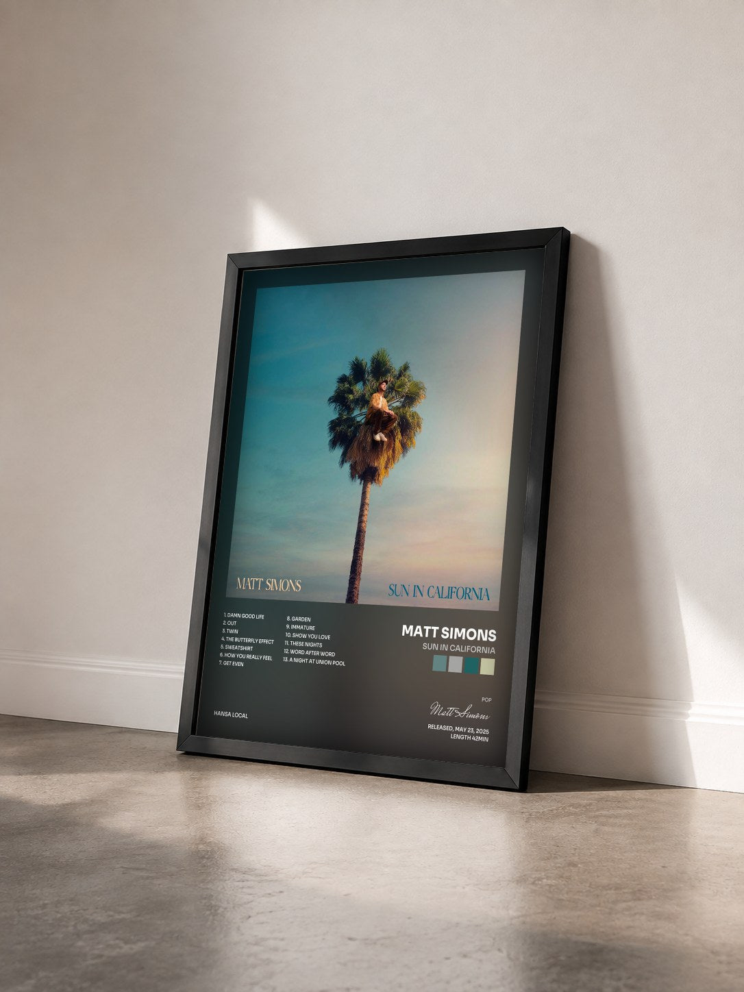 #noir Tableau de l'album Sun In California de Matt Simons vu de trois quarts, cadre noir
