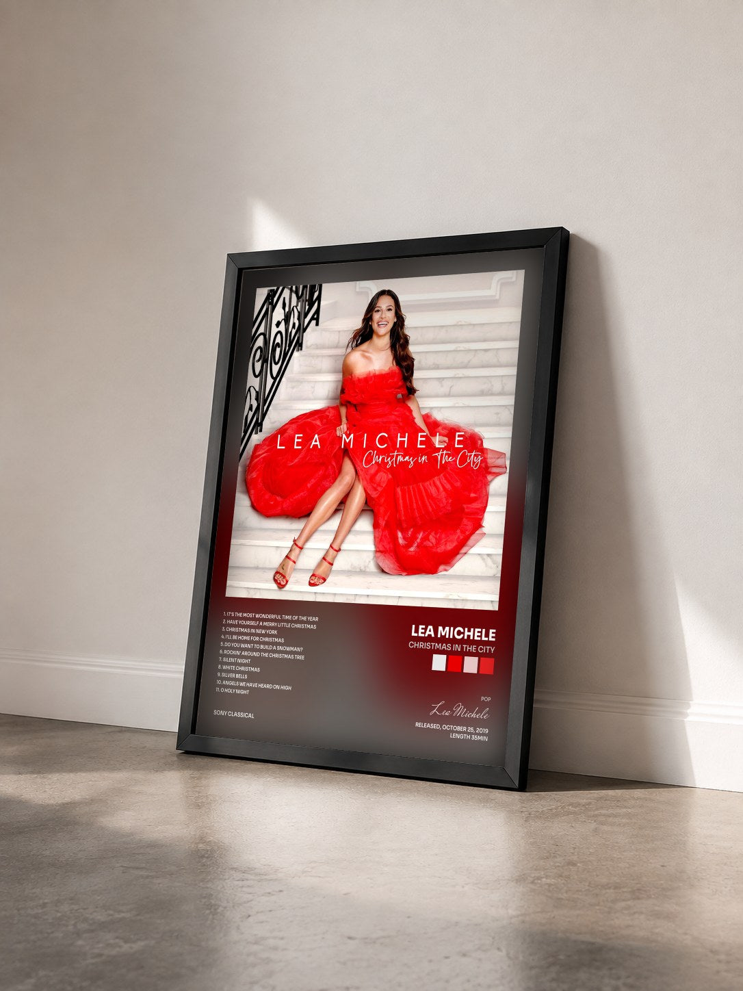 #noir Tableau de l'album Christmas in The City de Lea Michele vu de trois quarts, cadre noir