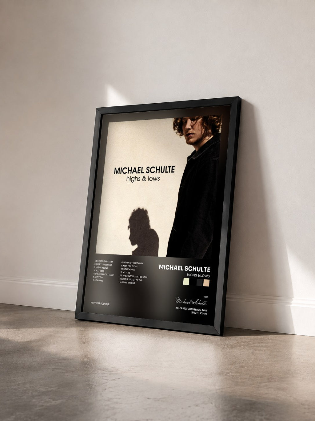 #noir Tableau de l'album Highs & Lows de Michael Schulte vu de trois quarts, cadre noir