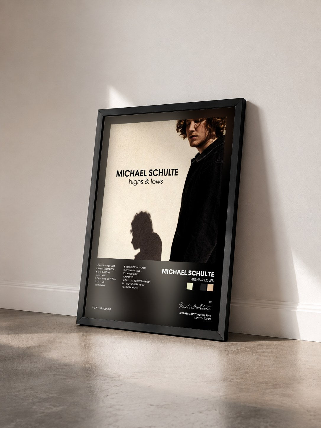 #noir Tableau de l'album Highs & Lows de Michael Schulte vu de trois quarts, cadre noir