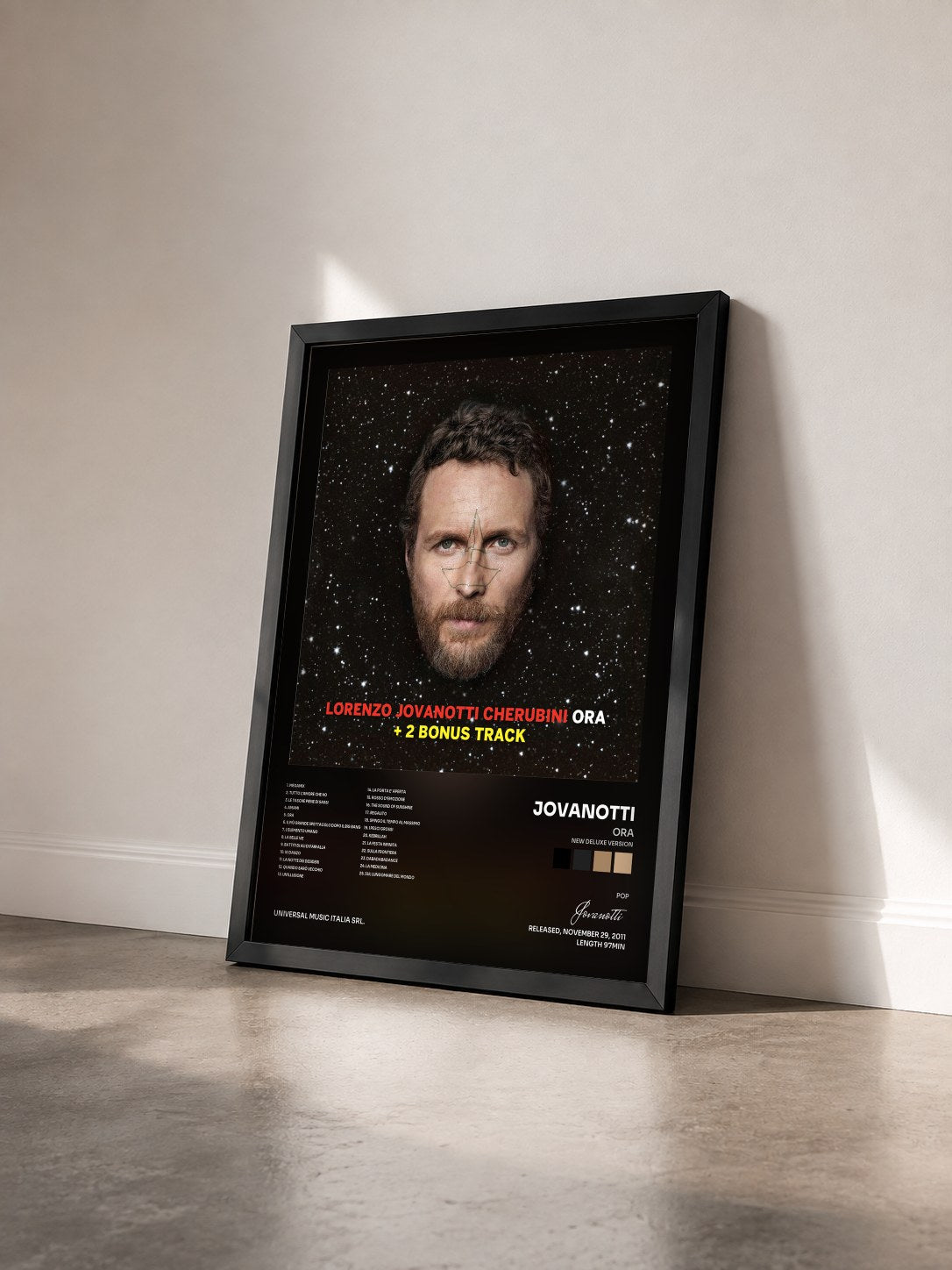 #noir Tableau de l'album Ora (New Deluxe Version) de Jovanotti vu de trois quarts, cadre noir