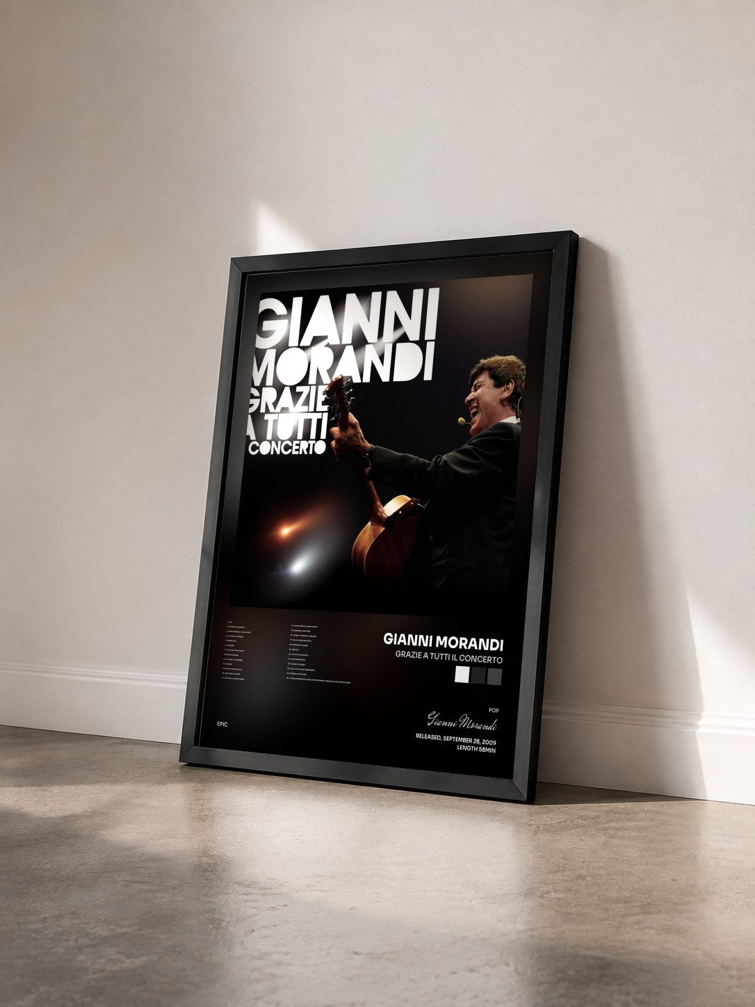 #noir Tableau de l'album Grazie A Tutti Il Concerto de Gianni Morandi vu de trois quarts, cadre noir